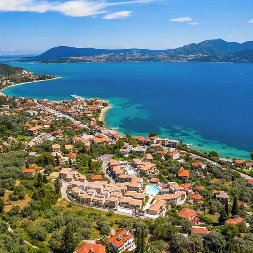 Aerial view of Nikiana, Lefkada, highlighting prime real estate along the coastline.