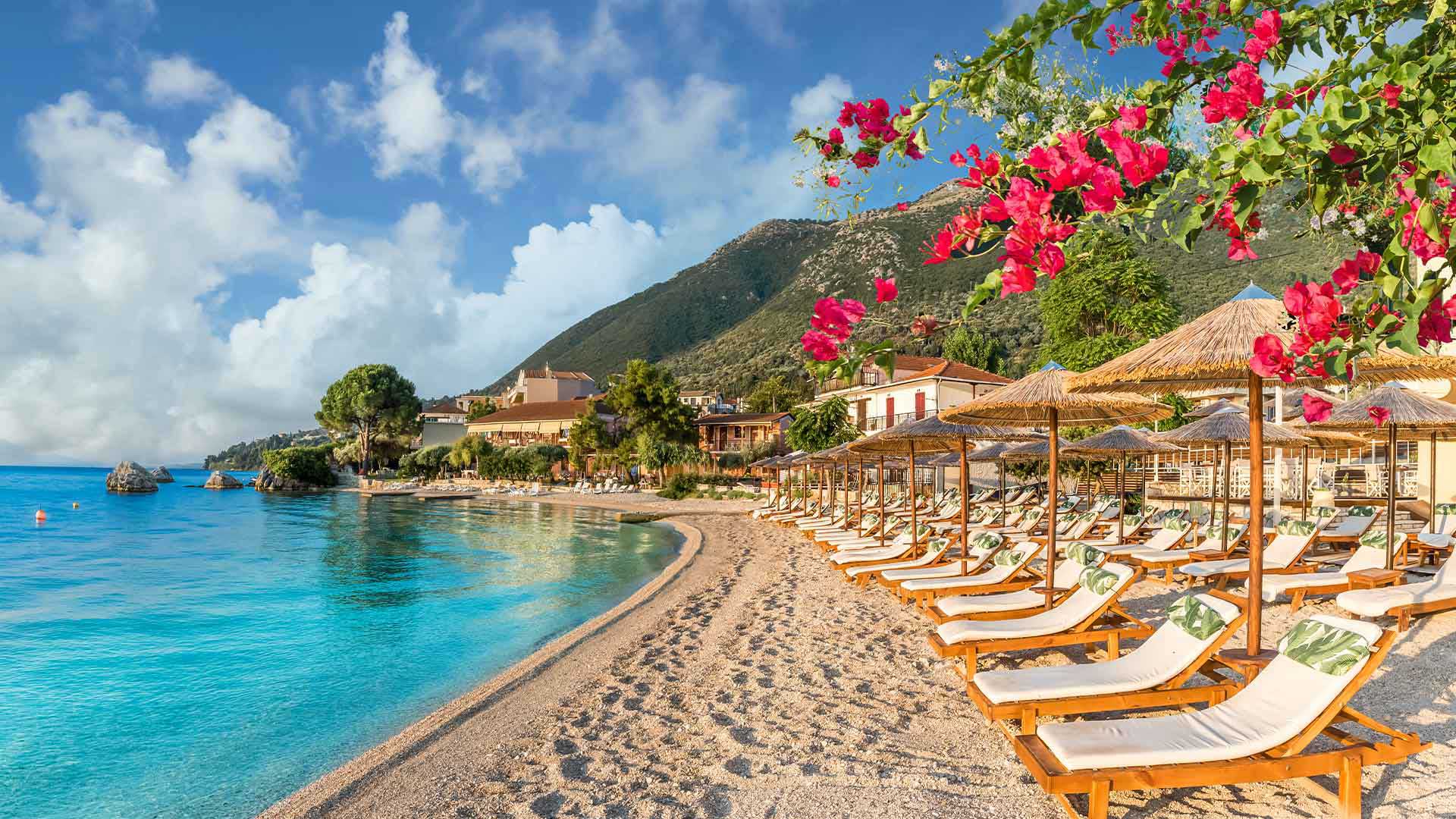 Resort beachfront in Nikiana, Lefkada, highlighting luxury real estate options.