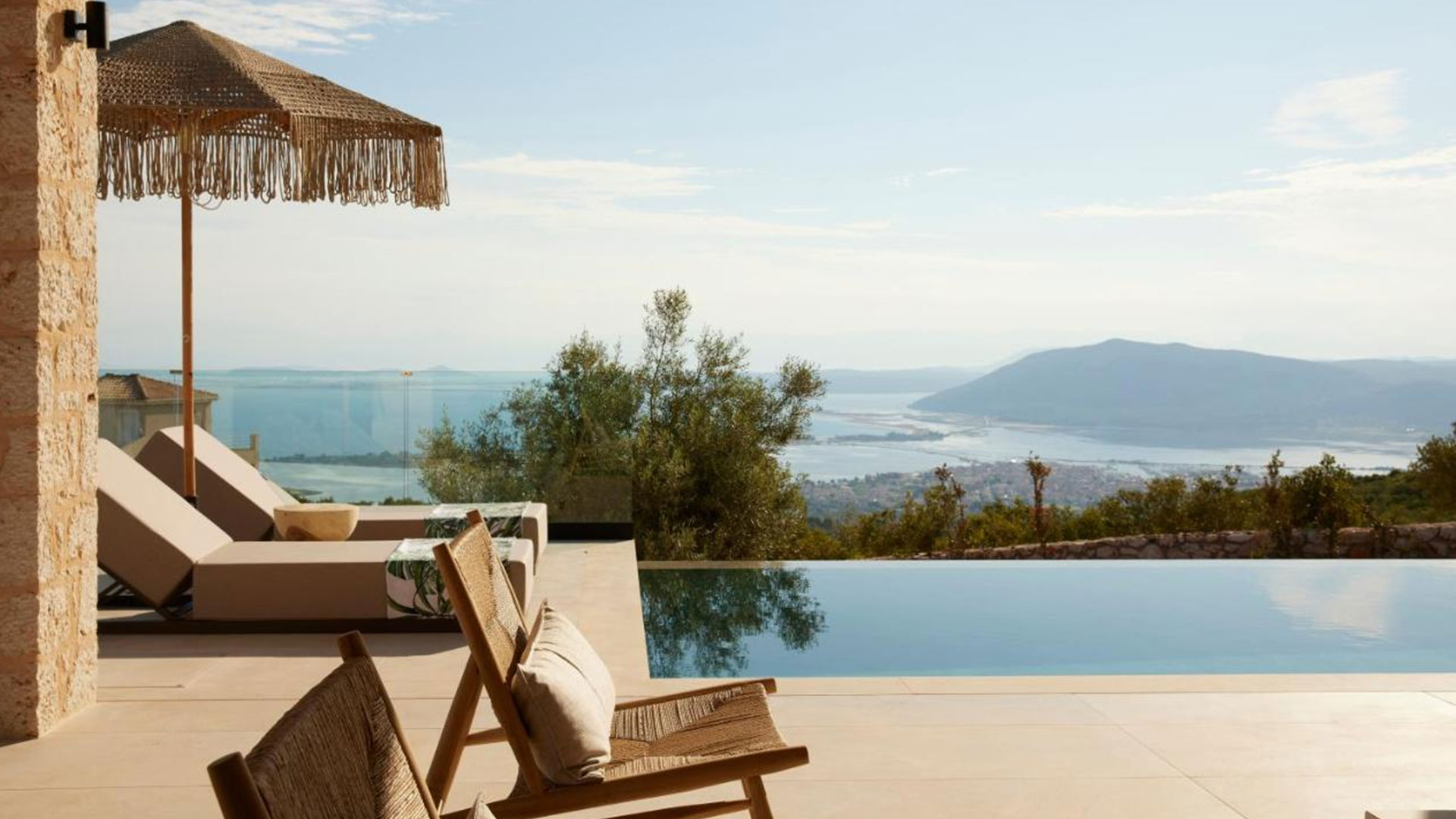 Luxurious poolside villa in Tsoukalades, Lefkada with a stunning view of the Ionian Sea.